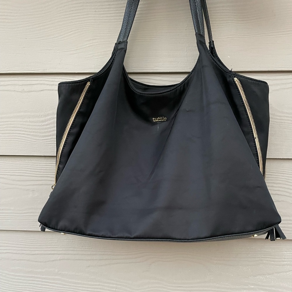 Tutilo black Tote Bag